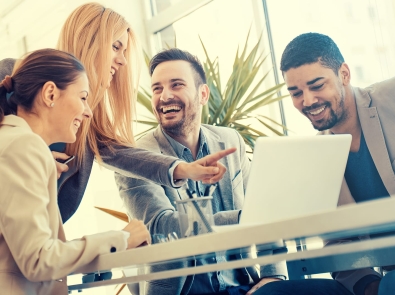 a group of business people smiling