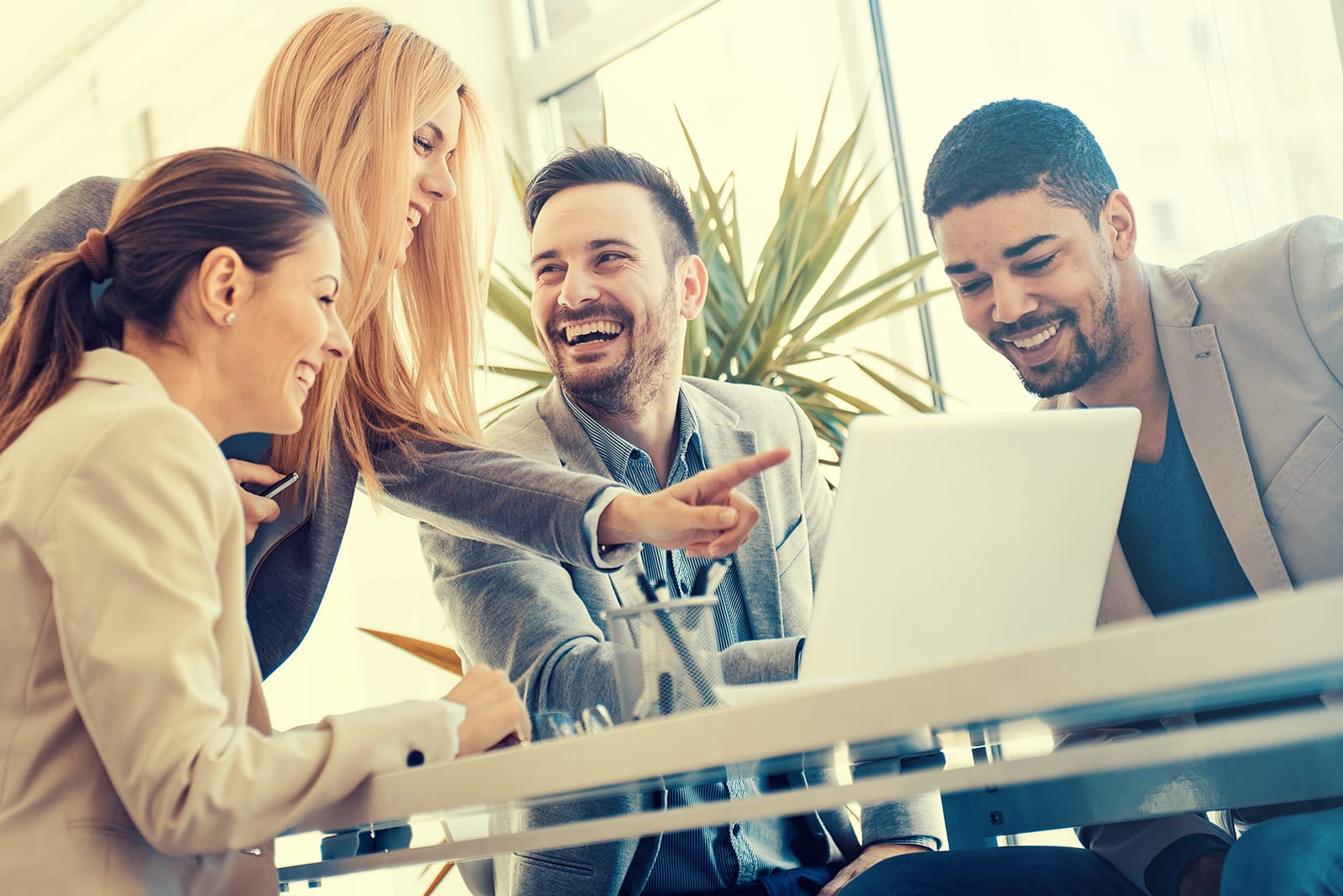 a group of business people smiling