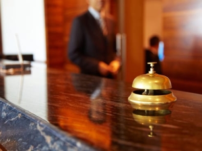 concierge desk with gold bell