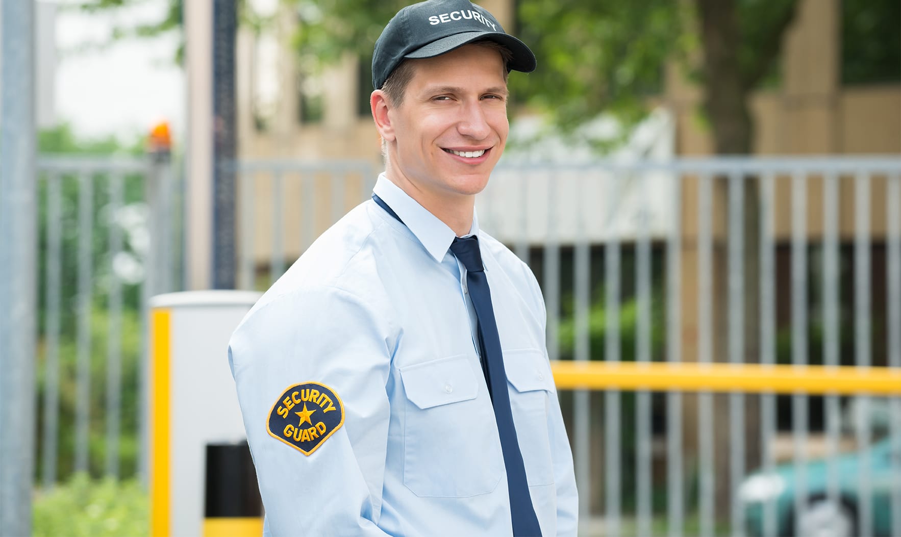 a smiling security guard