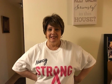 a planned employee wearing a "Nancy strong" tee shirt