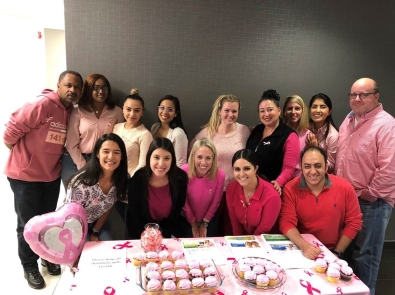 Planned employees at a breast cancer awareness event