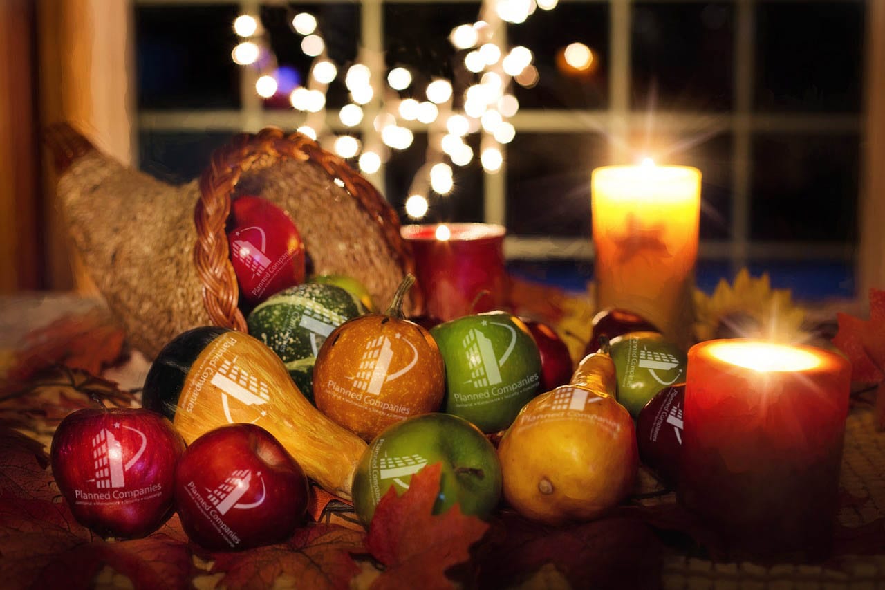 a cornucopia of fruit with the Planned Companies logo