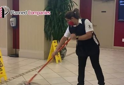 janitor mopping floor